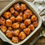 Baked chicken in French dressing glaze in casserole dish