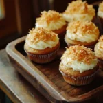 Coconut Cream Pie Cupcakes with toasted coconut and creamy frosting